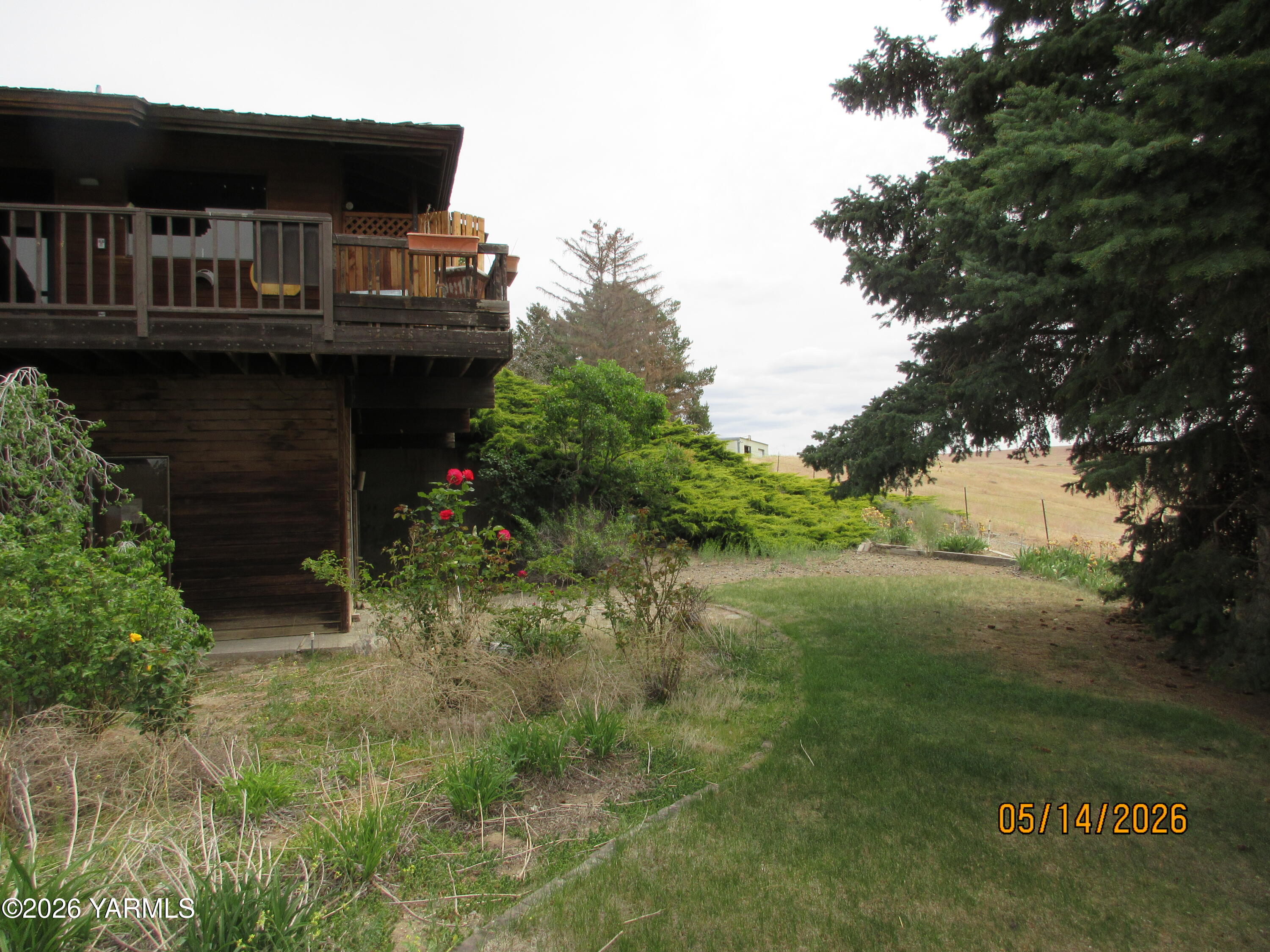 1303 Nightingale Road Wapato, WA 98951 - Photo 22 of 26 a view of house with outdoor space