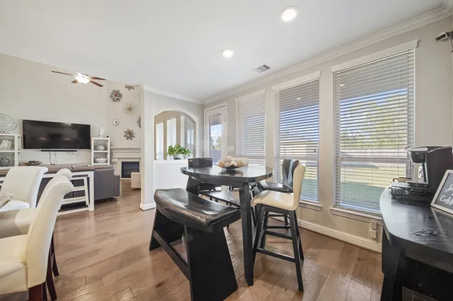 a view of a livingroom with furniture and a flat screen tv