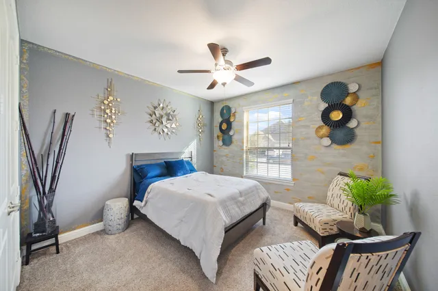a living room with furniture and a window