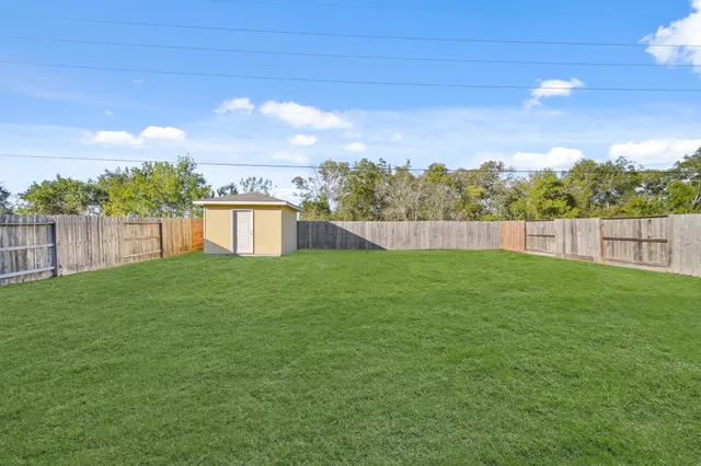 a view of an house with backyard space