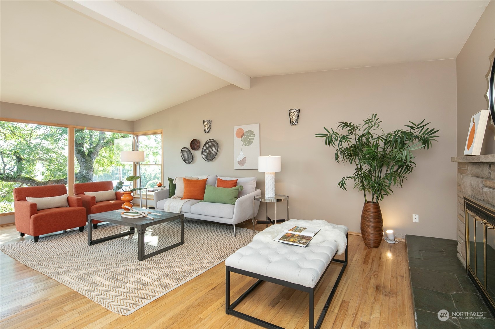 365 Maple Avenue Northwest Renton, WA 98057 - Photo 2 of 35 a living room with furniture and a large window
