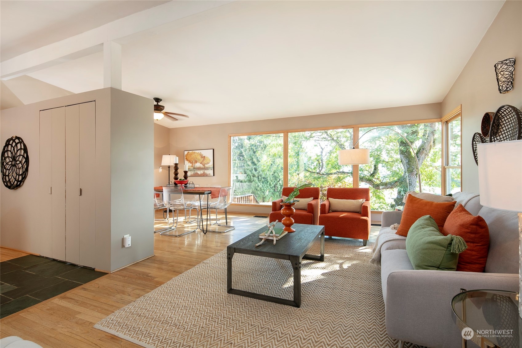 365 Maple Avenue Northwest Renton, WA 98057 - Photo 6 of 35 a living room with furniture and a large window