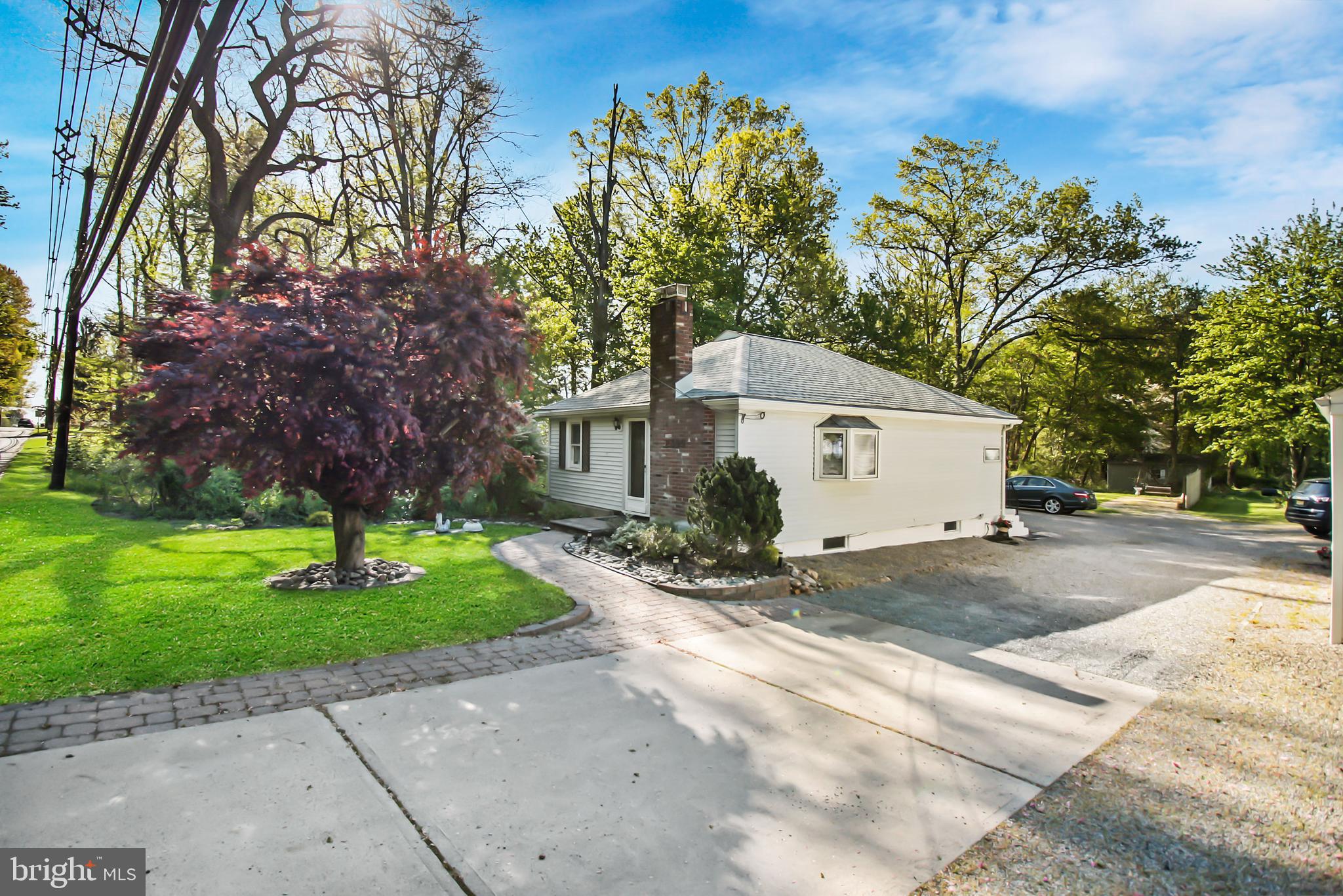 2399 Kuser Road Hamilton, NJ 08690 - Photo 2 of 15 Side and driveway of home