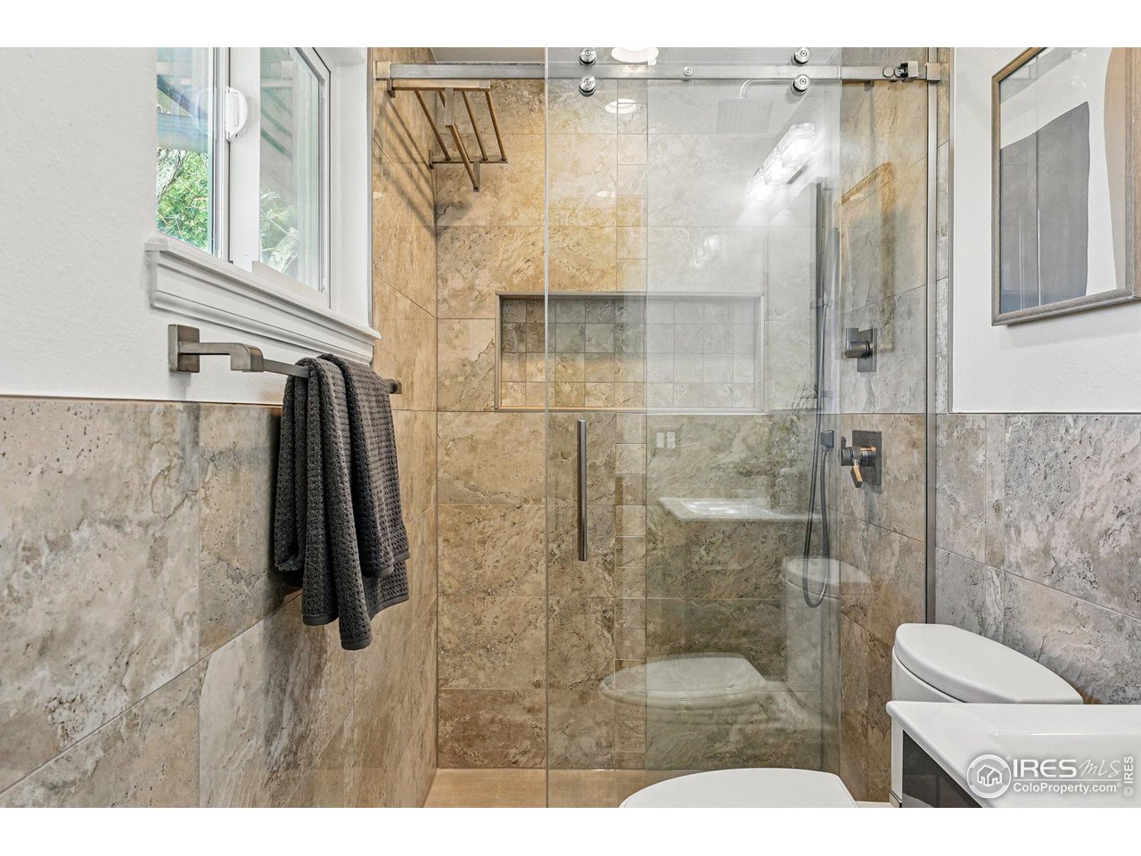 3495 Endicott Drive Boulder, CO 80305 - Photo 18 of 40 a bathroom with a shower and a sink