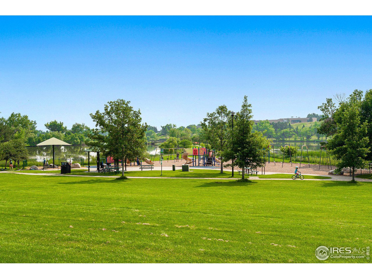 3495 Endicott Drive Boulder, CO 80305 - Photo 39 of 40 a view of a grassy field with trees