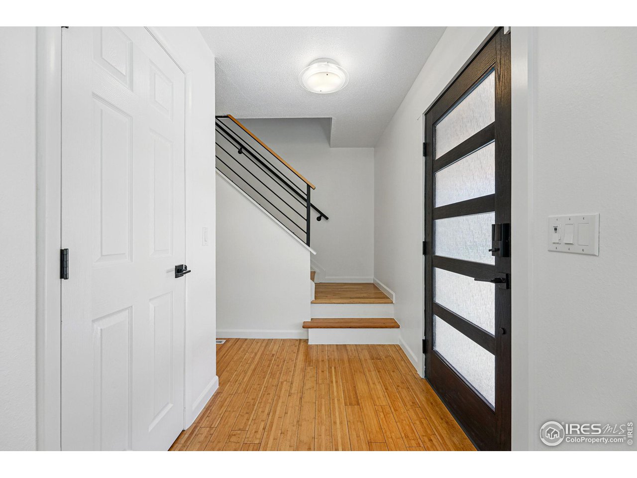 3495 Endicott Drive Boulder, CO 80305 - Photo 4 of 40 a view of entryway with wooden floor
