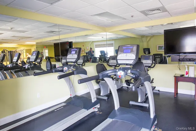a view of a dining area with furniture window and outside view
