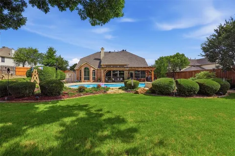 $585,000 | 2455 Whispering Breeze Drive, Grand Prairie, TX 75050