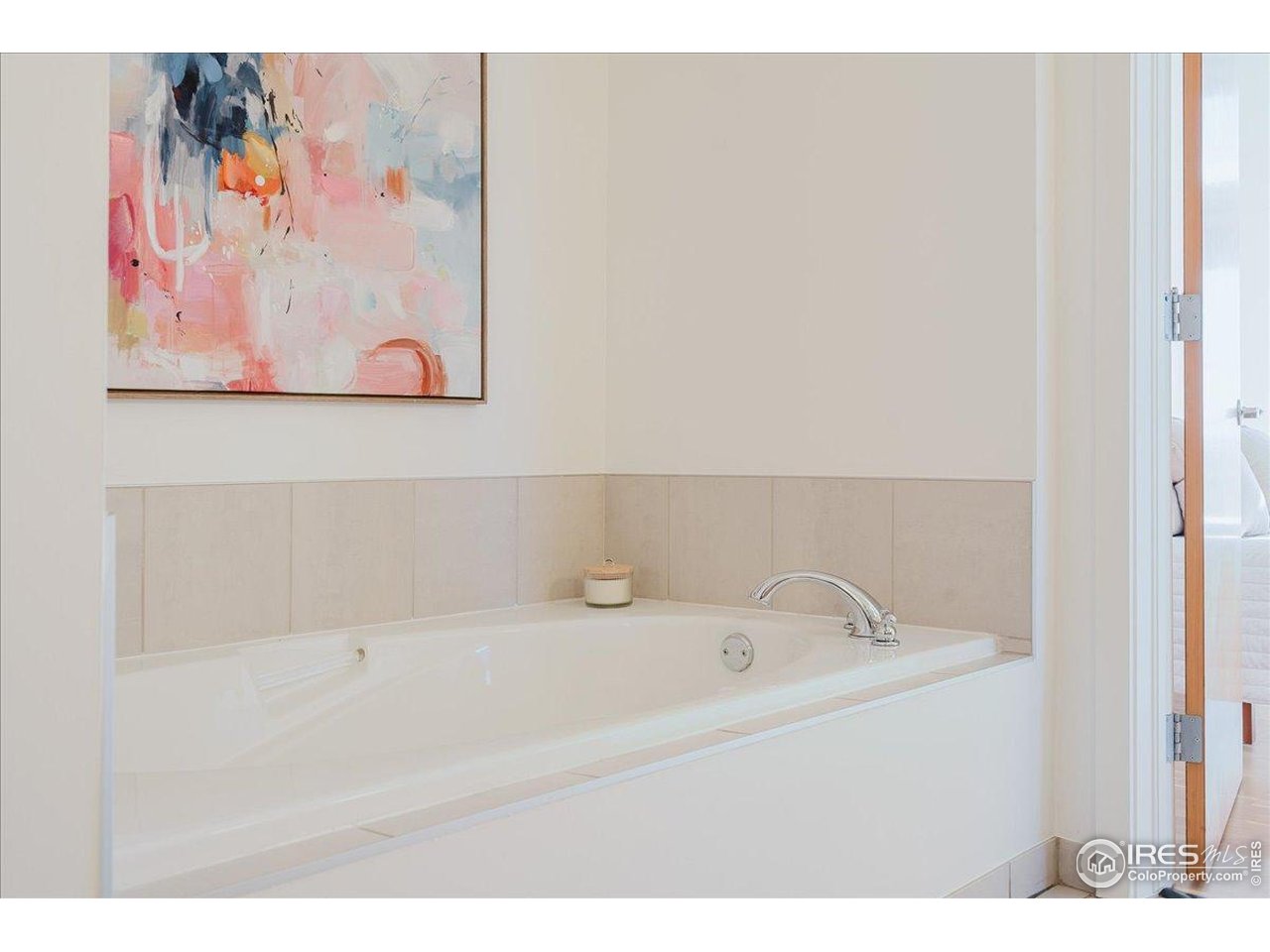 1925 West 32nd Avenue, Unit 401 Denver, CO 80211 - Photo 21 of 42 a bathroom with a tub and sink