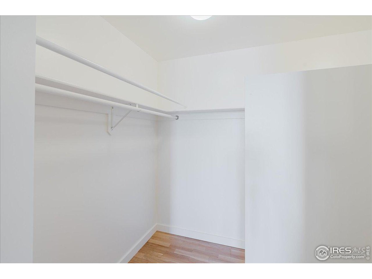 1925 West 32nd Avenue, Unit 401 Denver, CO 80211 - Photo 23 of 42 a view of small space with racks on the wall