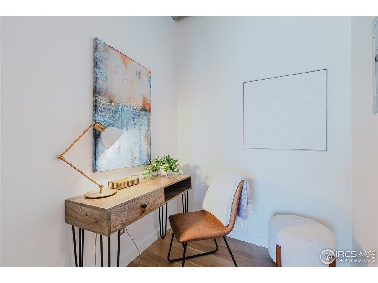 1925 West 32nd Avenue, Unit 401 Denver, CO 80211 - Photo 30 of 42 a workspace room with furniture and wooden floor