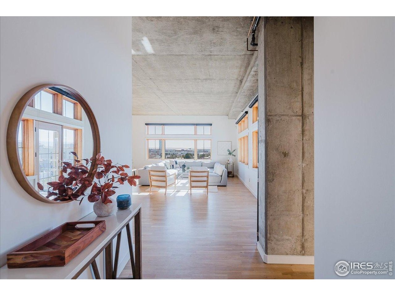 1925 West 32nd Avenue, Unit 401 Denver, CO 80211 - Photo 5 of 42 a view of living room and dining room