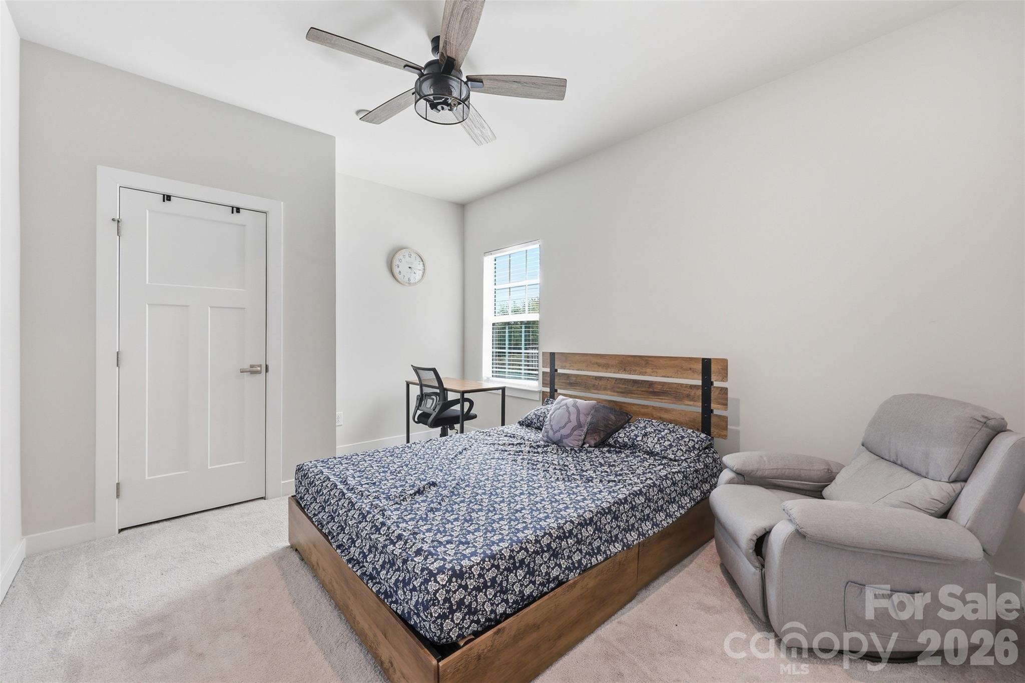 3057 Ballester Road Fort Mill, SC 29707 - Photo 14 of 48 a bedroom with a large bed and a couch