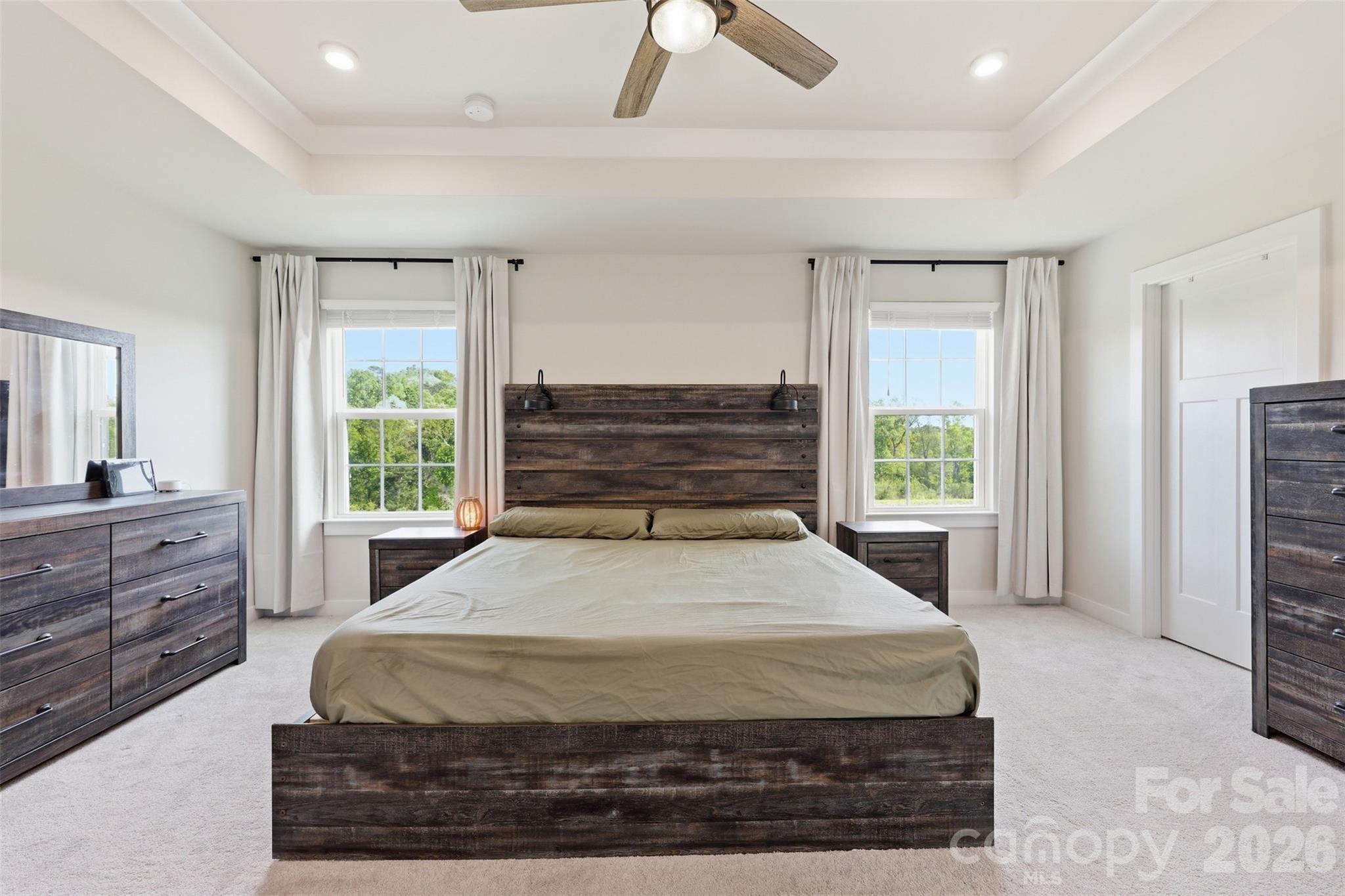 3057 Ballester Road Fort Mill, SC 29707 - Photo 19 of 48 a spacious bedroom with a large bed and a window