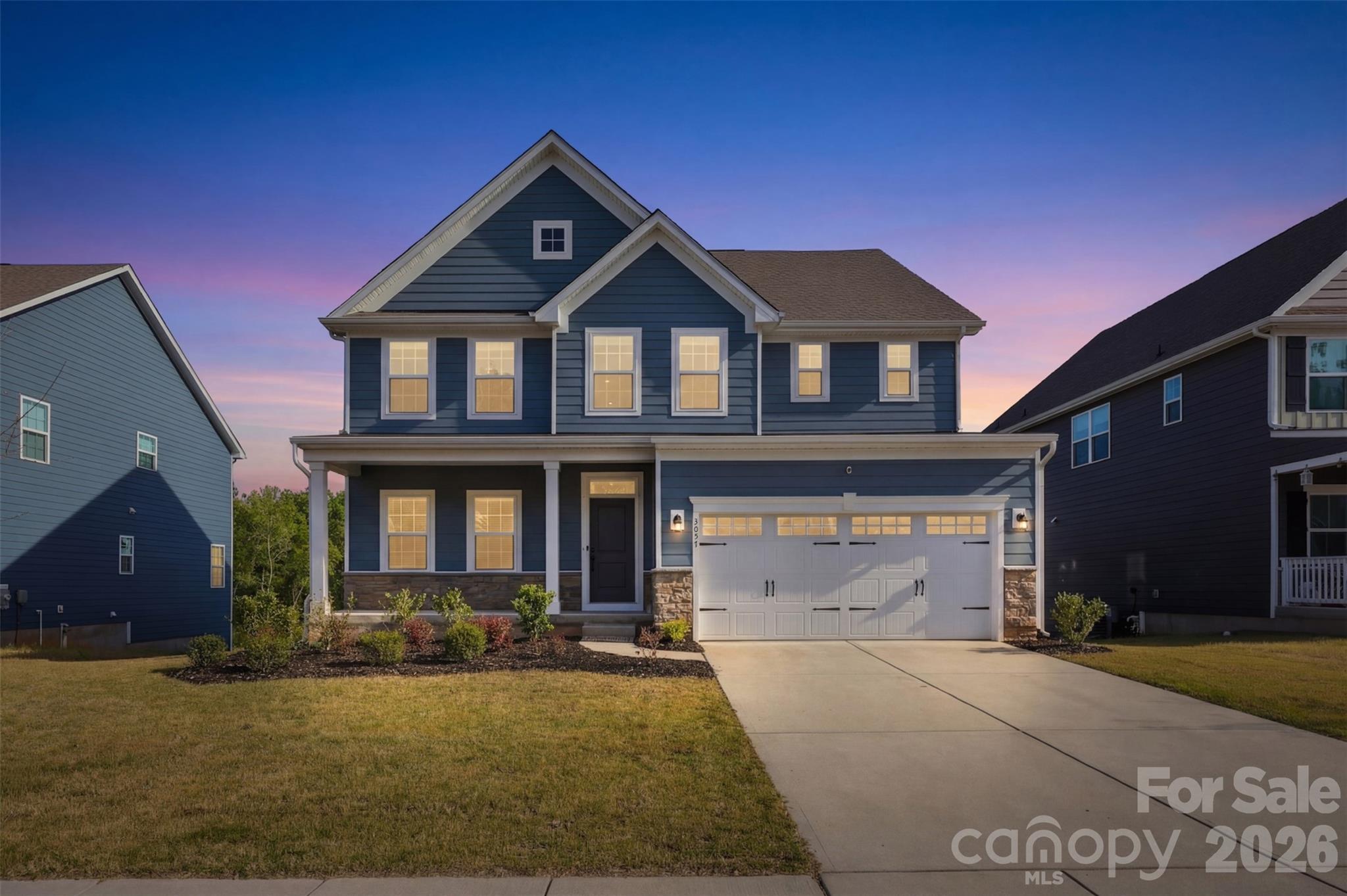 3057 Ballester Road Fort Mill, SC 29707 - Photo 2 of 48 a front view of a house with a yard