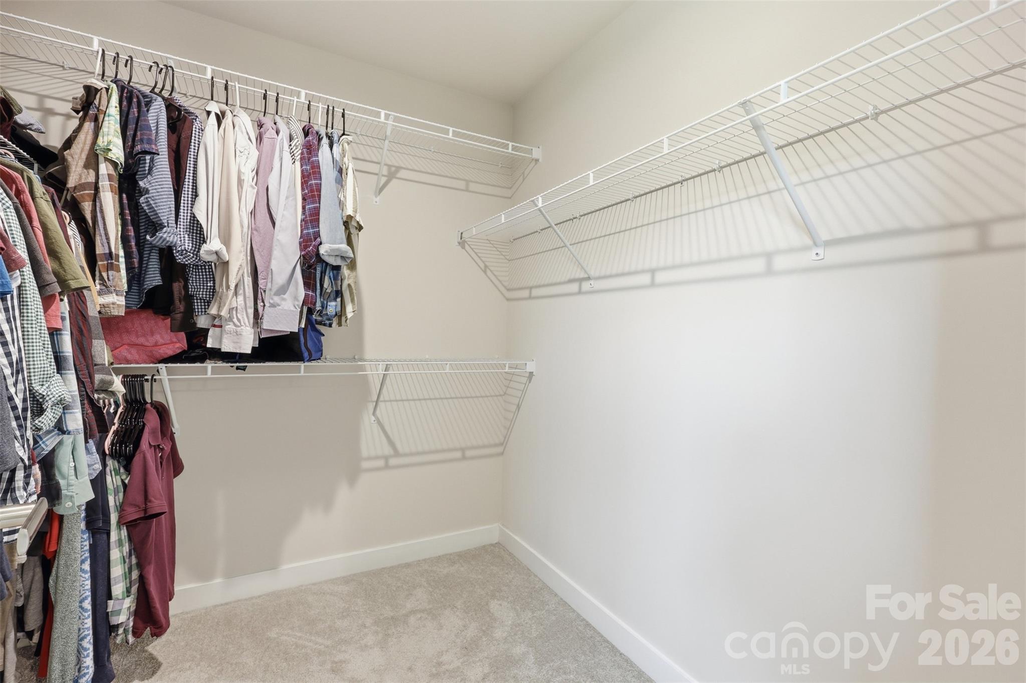 3057 Ballester Road Fort Mill, SC 29707 - Photo 26 of 48 a view of walk in closet with clothes