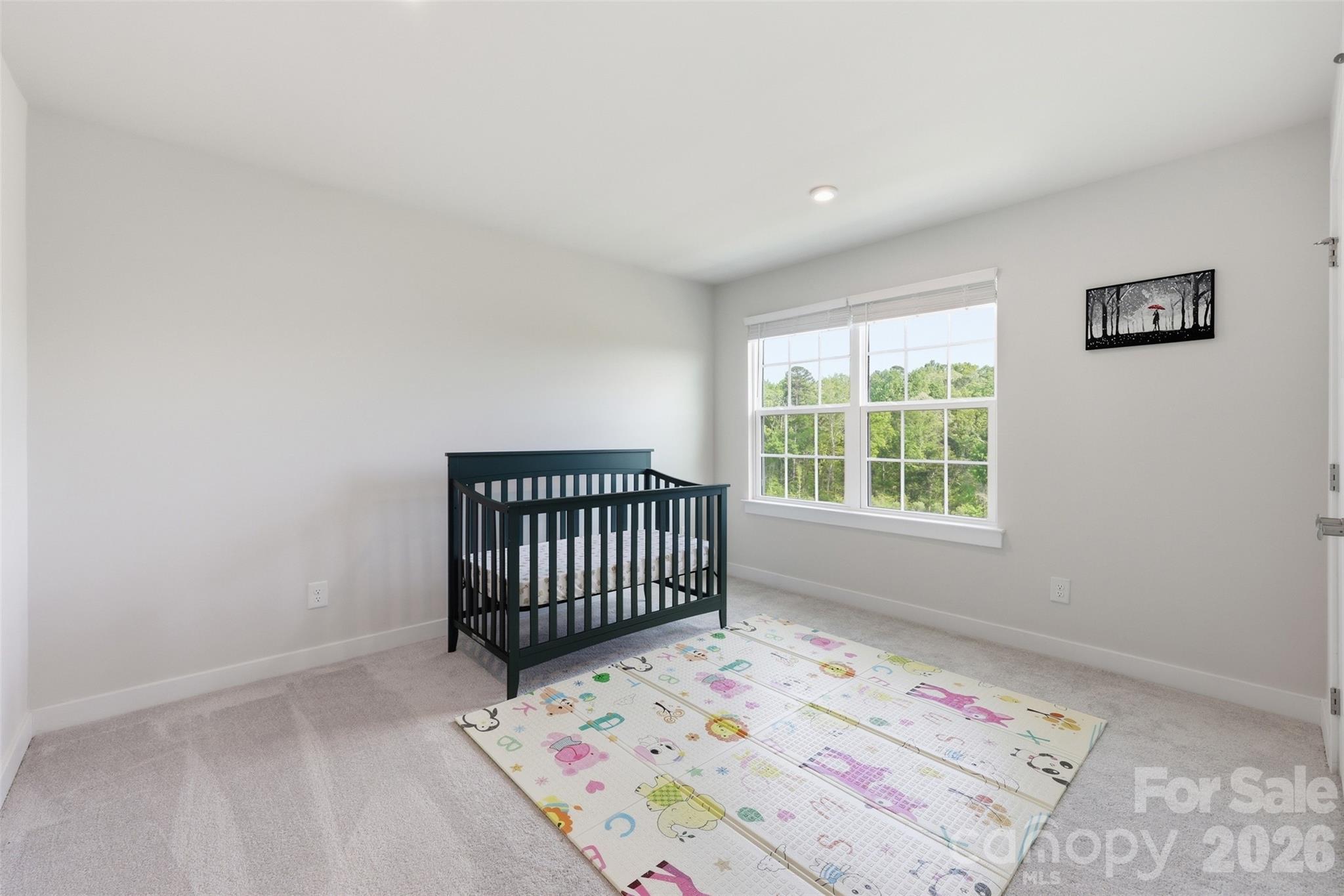 3057 Ballester Road Fort Mill, SC 29707 - Photo 27 of 48 a bedroom with a bed and a window