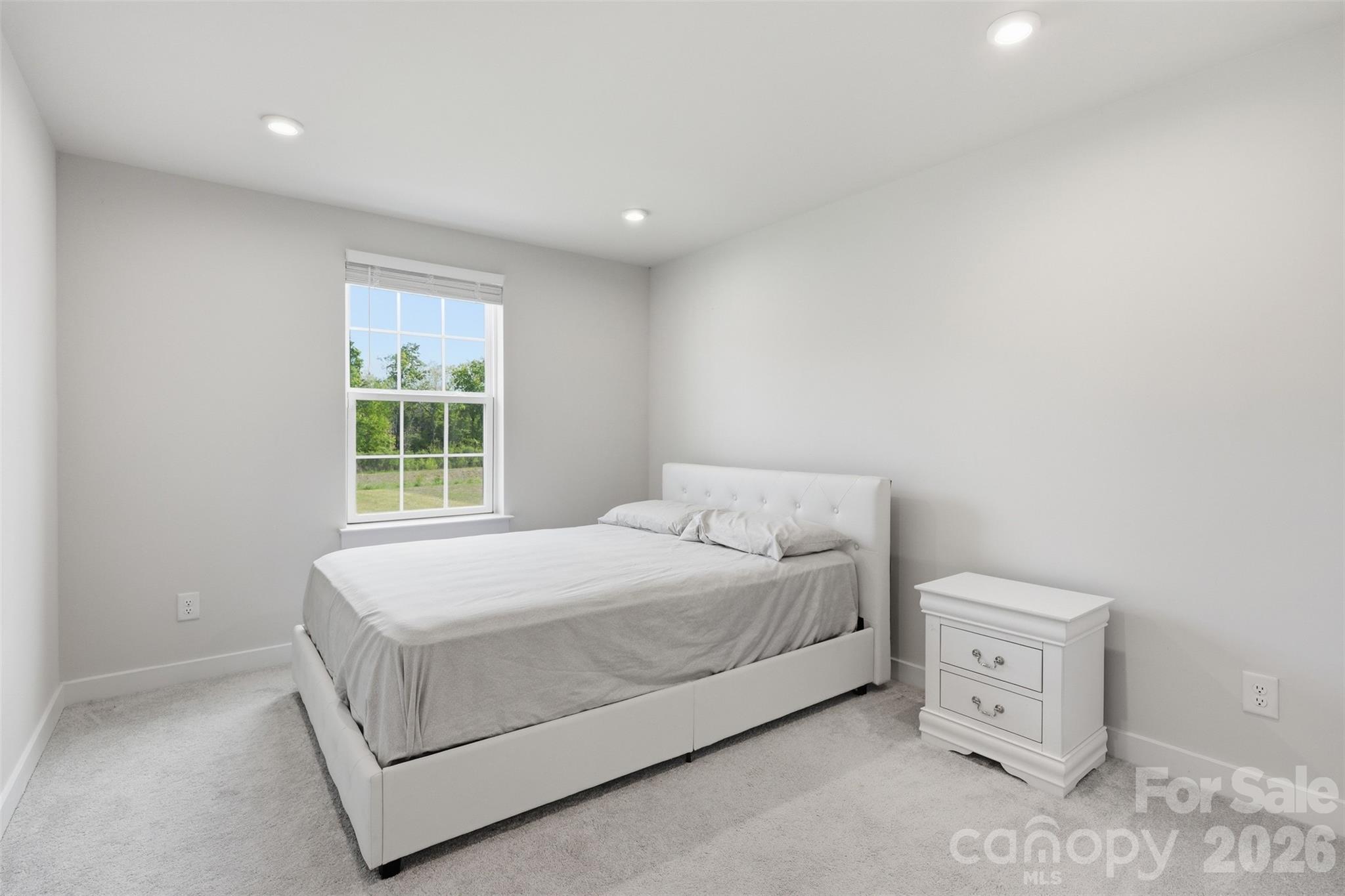 3057 Ballester Road Fort Mill, SC 29707 - Photo 30 of 48 a bedroom with a bed and a window