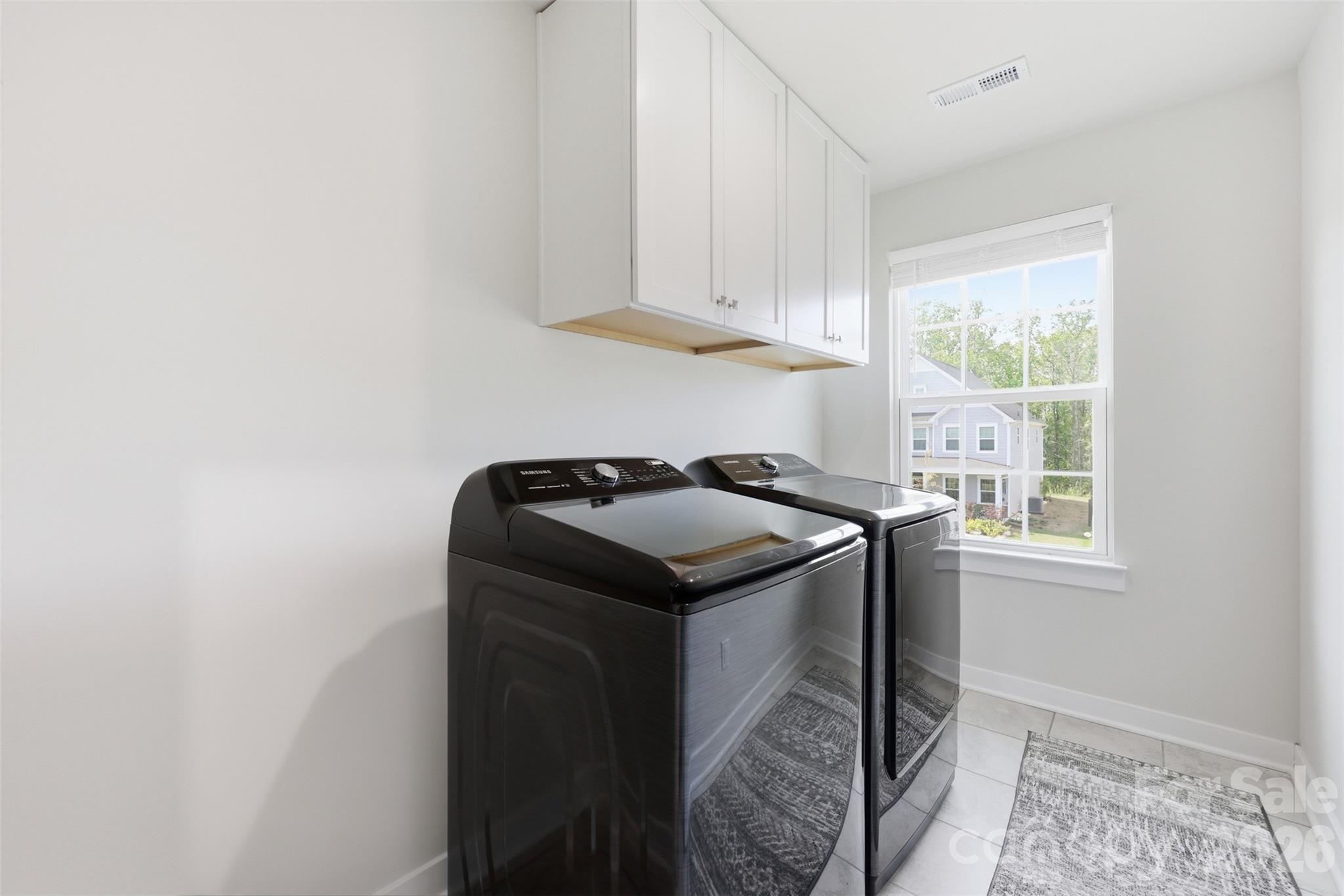 3057 Ballester Road Fort Mill, SC 29707 - Photo 32 of 48 a utility room with dryer and washer
