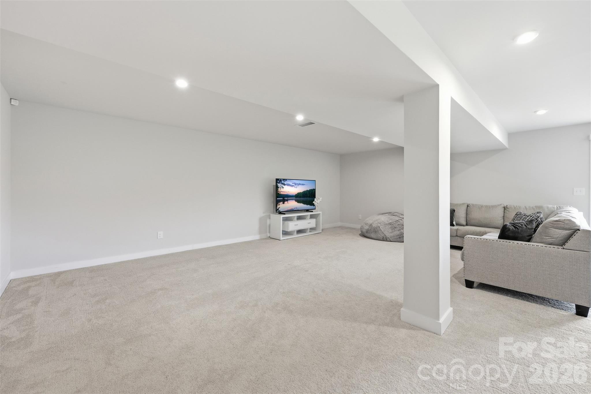 3057 Ballester Road Fort Mill, SC 29707 - Photo 35 of 48 a living room with furniture and a couch
