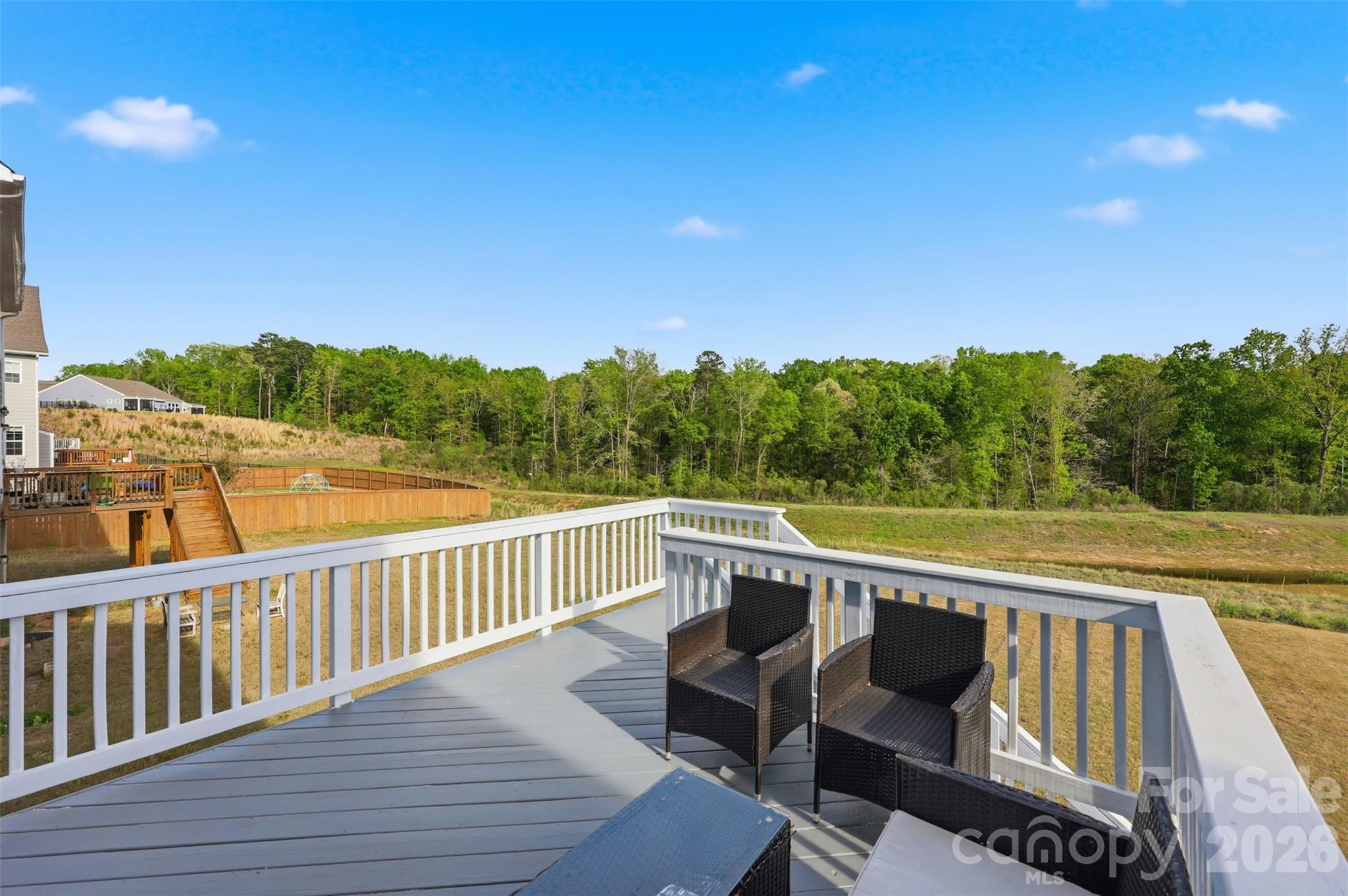 3057 Ballester Road Fort Mill, SC 29707 - Photo 40 of 48 a view of a balcony with wooden floor and outdoor seating
