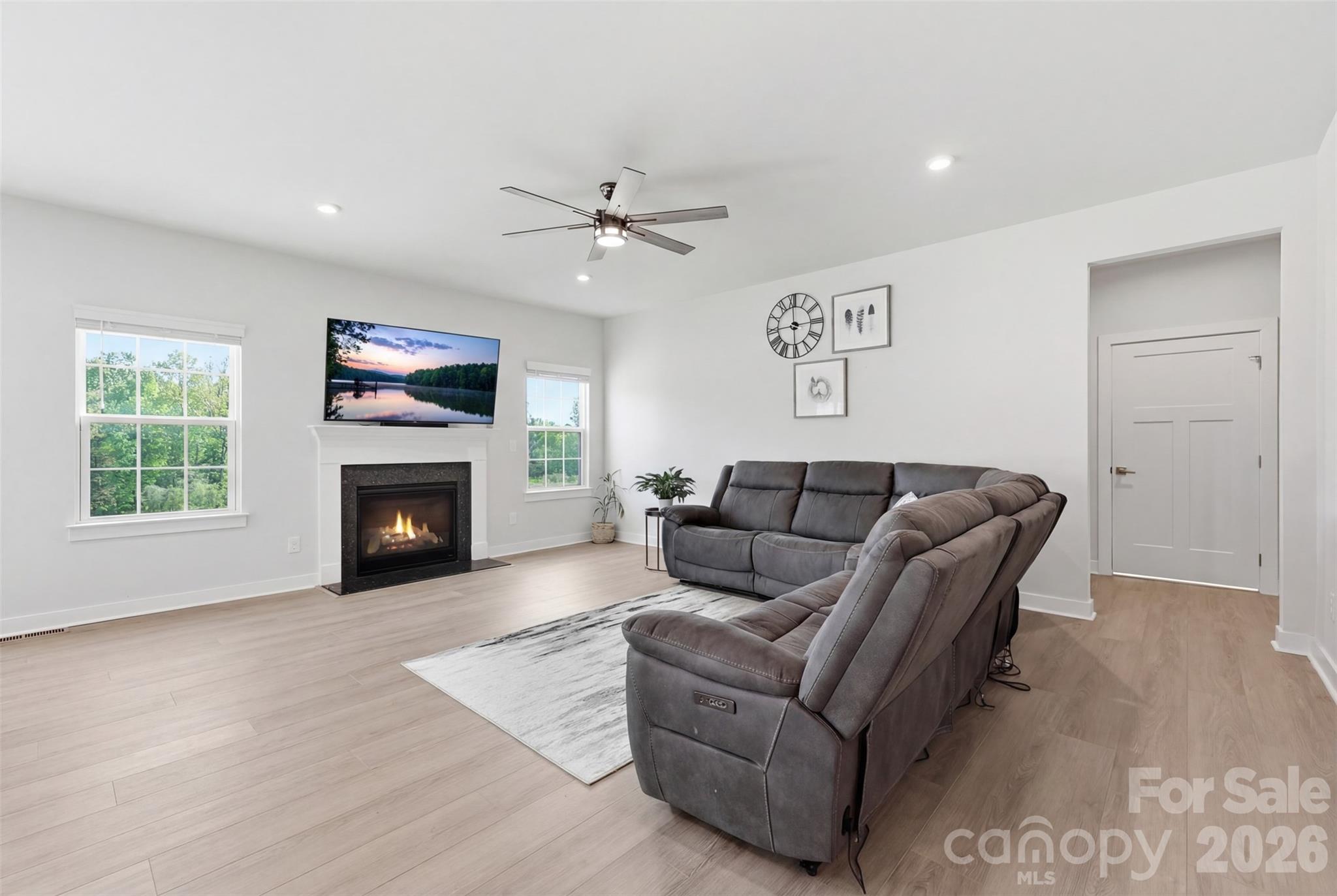 3057 Ballester Road Fort Mill, SC 29707 - Photo 8 of 48 a living room with furniture and a fireplace