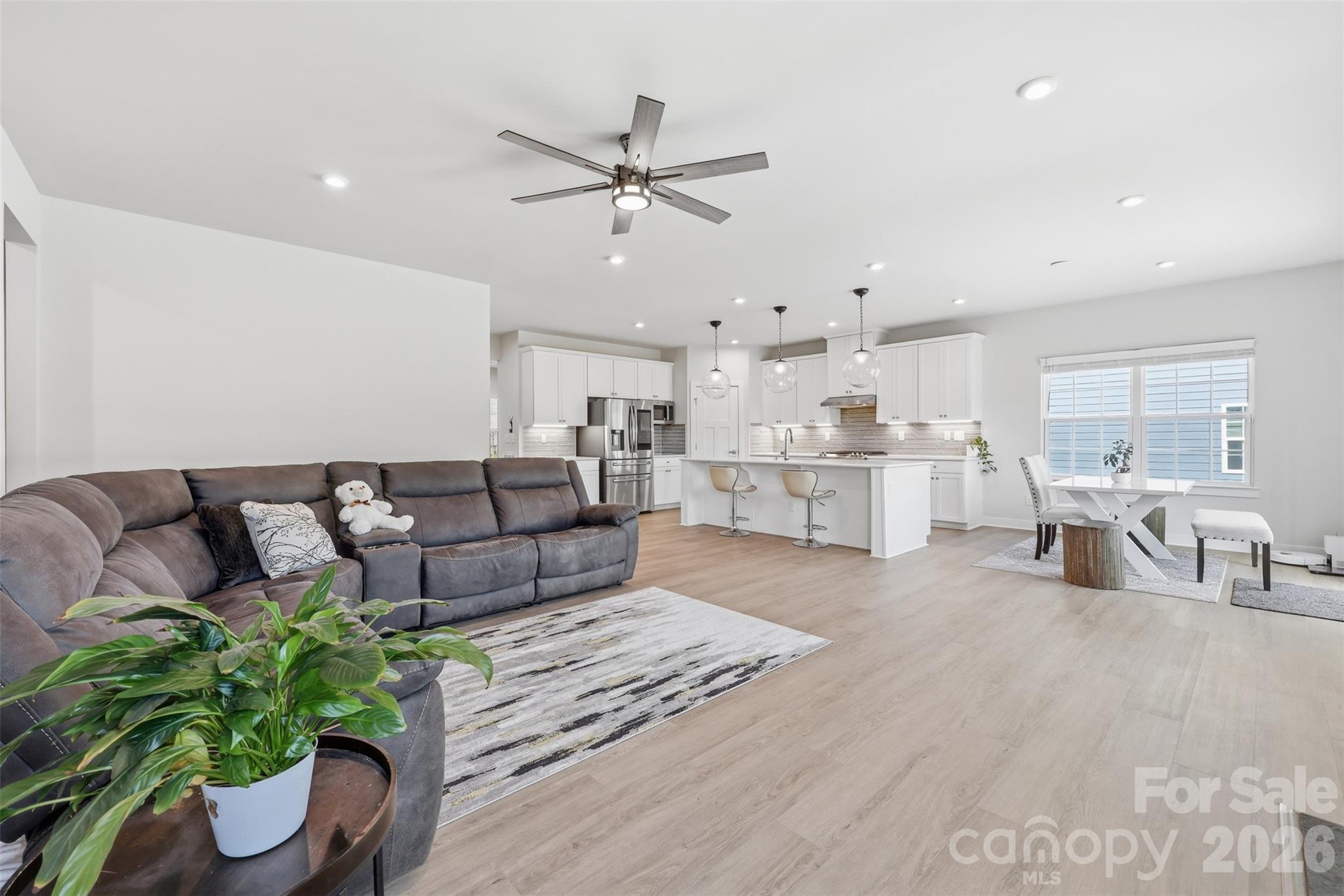 3057 Ballester Road Fort Mill, SC 29707 - Photo 9 of 48 a living room with furniture and a potted plant