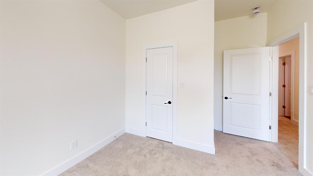 313 Buck Ridge Drive Frisco, TX 75068 - Photo 14 of 20 Interior space featuring plush carpeting, white trim, and light-colored walls