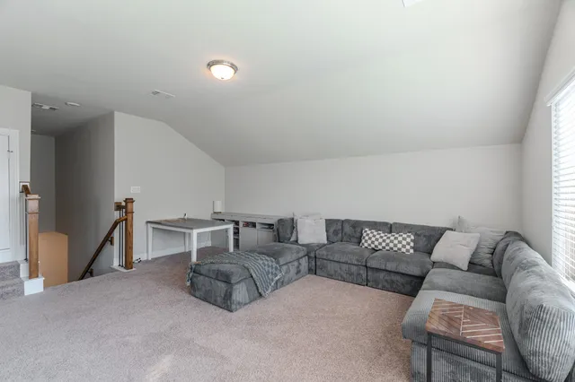 a living room with furniture and a couch