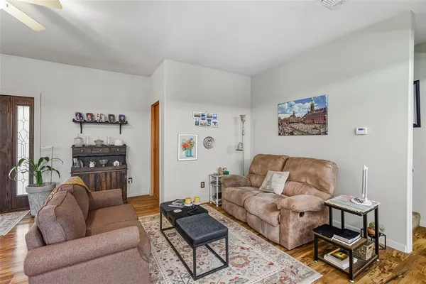 a living room with furniture and a couch