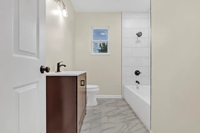 a bathroom with a bathtub