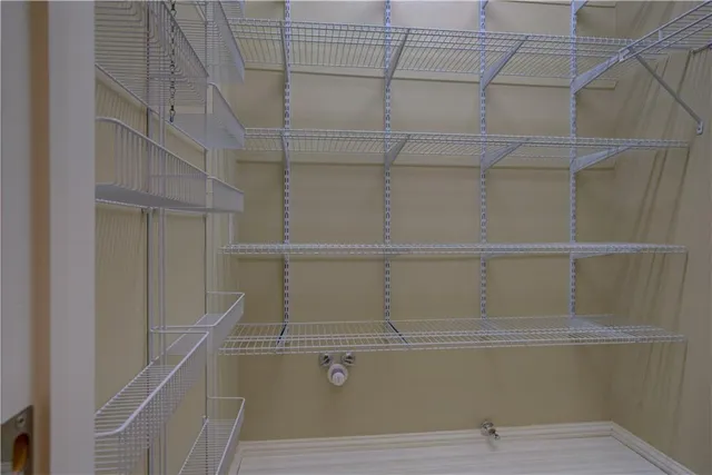 a view of empty room with windows