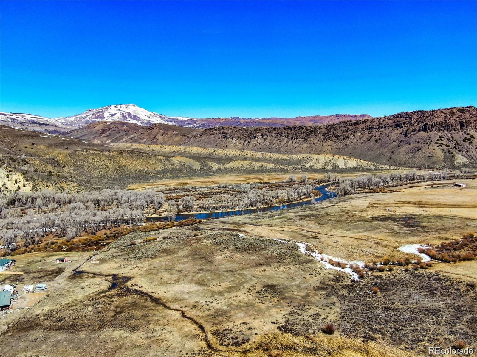 13-15 Block 5 Cedar Street Hot Sulphur Springs, CO 80451 - Photo 5 of 5 a view of an ocean and a mountain