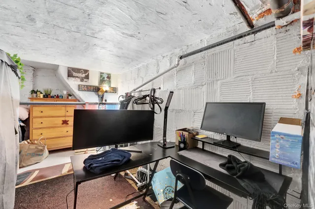 a view of a workspace with furniture