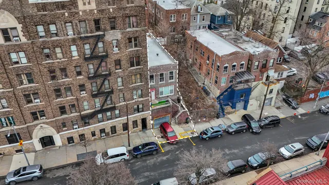 a view of building with parking area