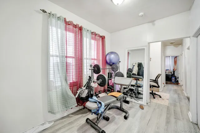 a work room with furniture and a window