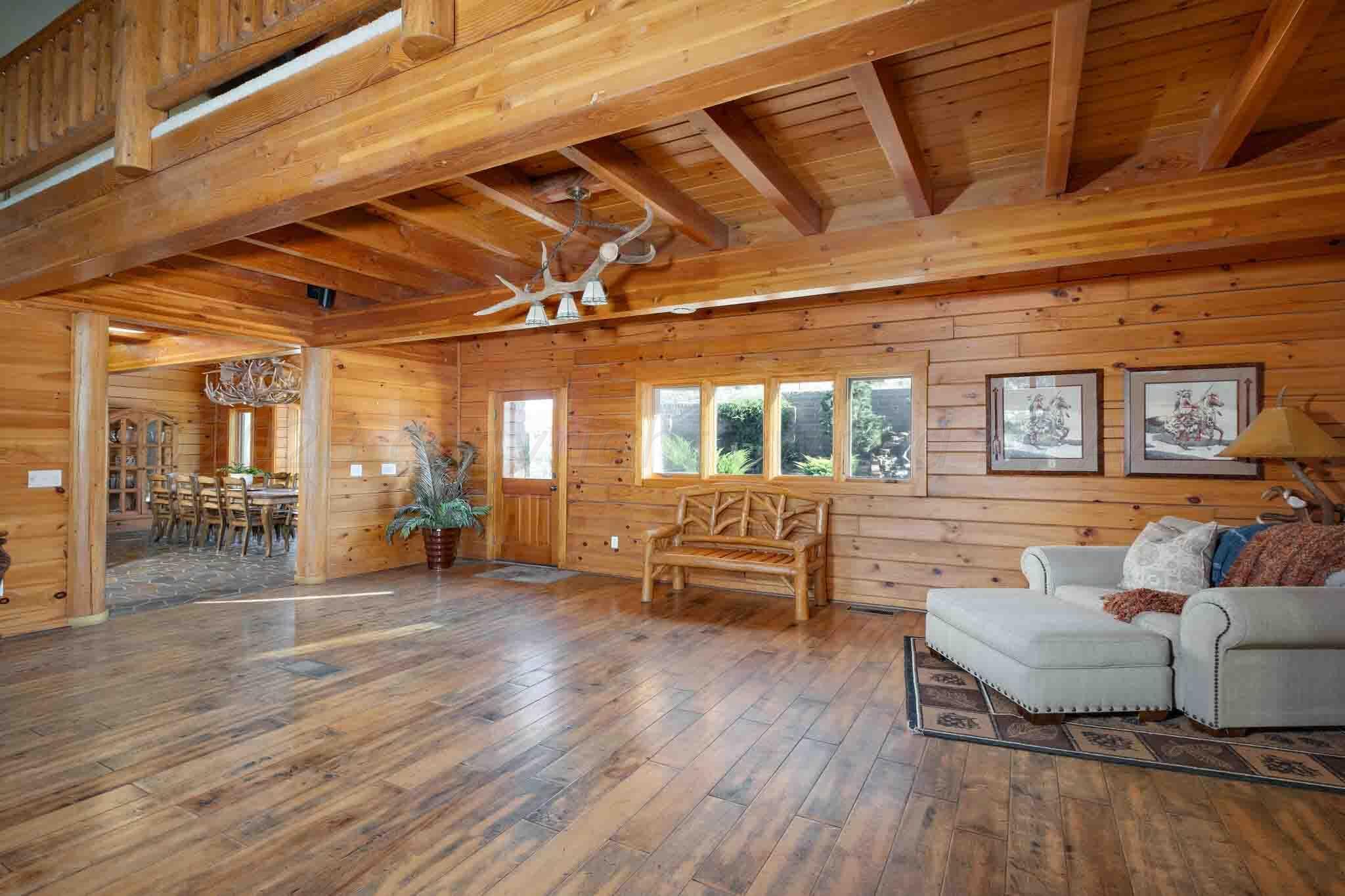 21401 Hope Road Canyon, TX 79015 - Photo 20 of 121 a living room with furniture and wooden floor