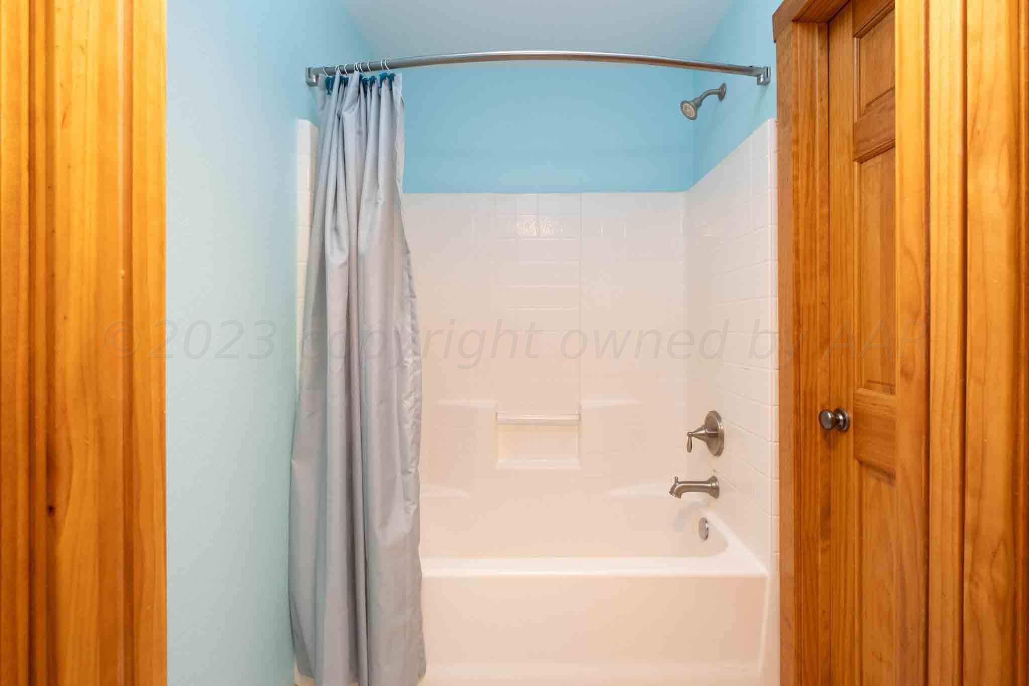 21401 Hope Road Canyon, TX 79015 - Photo 57 of 121 a bathroom with a shower and a tub