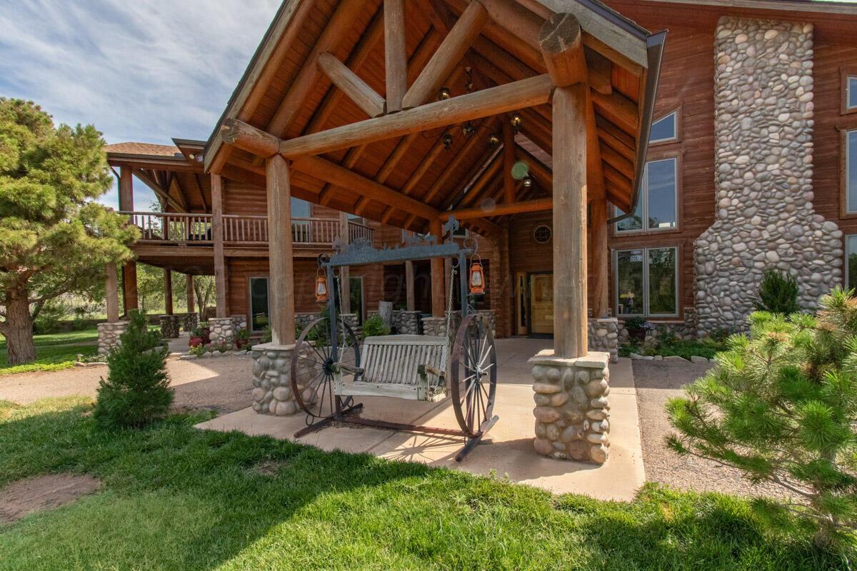 21401 Hope Road Canyon, TX 79015 - Photo 8 of 121 a view of a backyard with table and chairs and potted plants