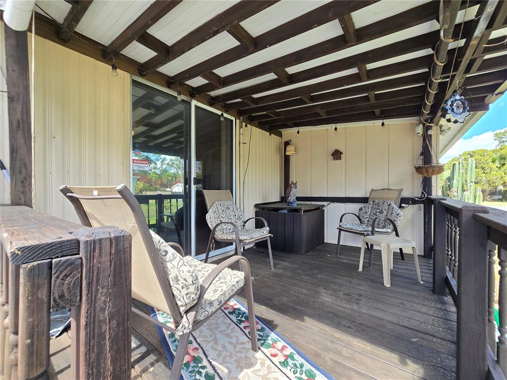 1621 Haddock Street St. Cloud, FL 34771 - Photo 15 of 46 a view of an outdoor space with seating area