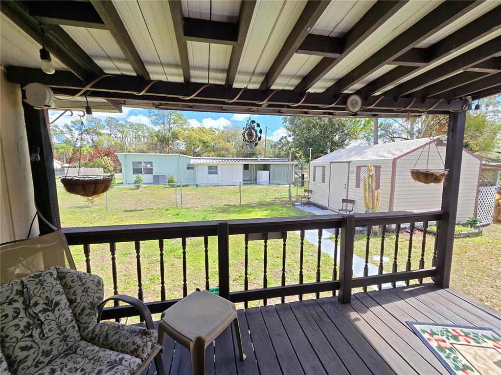 1621 Haddock Street St. Cloud, FL 34771 - Photo 16 of 46 a view of a balcony with chairs