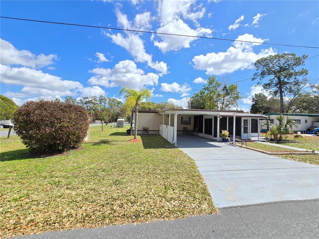 1621 Haddock Street St. Cloud, FL 34771 - Photo 2 of 46 a view of swimming pool with a patio