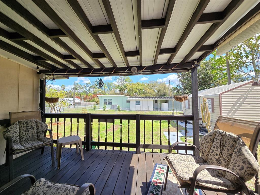 1621 Haddock Street St. Cloud, FL 34771 - Photo 41 of 46 a front view of a house with outdoor seating