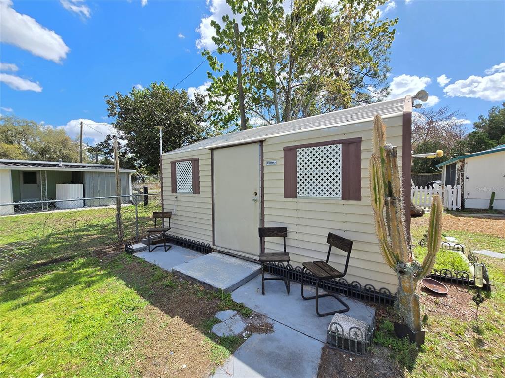1621 Haddock Street St. Cloud, FL 34771 - Photo 43 of 46 a view of a backyard with a sitting area