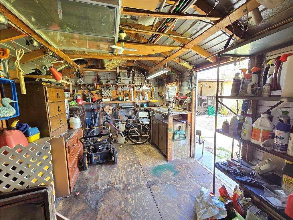 1621 Haddock Street St. Cloud, FL 34771 - Photo 46 of 46 a view of a storage room with a lot of stuff