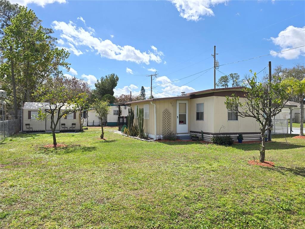 1621 Haddock Street St. Cloud, FL 34771 - Photo 10 of 46 a view of back yard of the house