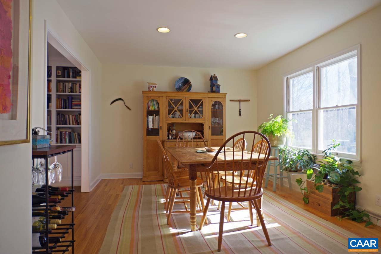 2657 Cardinal Ridge Road Charlottesville, VA 22901 - Photo 17 of 50 a view of a dining room with furniture and wooden floor