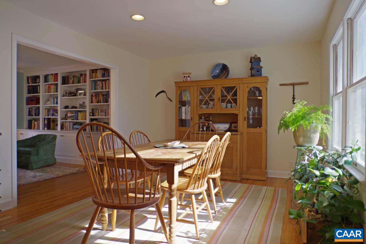 2657 Cardinal Ridge Road Charlottesville, VA 22901 - Photo 18 of 50 a view of a dining room with furniture and wooden floor