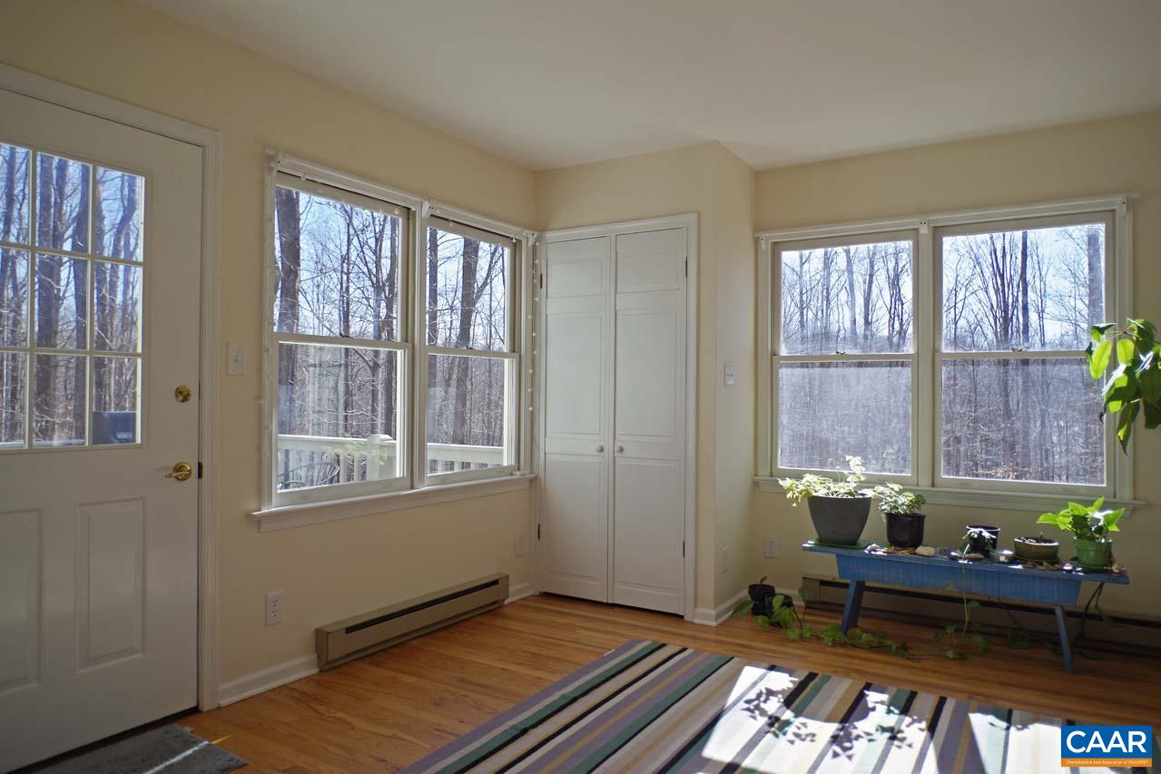 2657 Cardinal Ridge Road Charlottesville, VA 22901 - Photo 21 of 50 a living room with furniture and a window