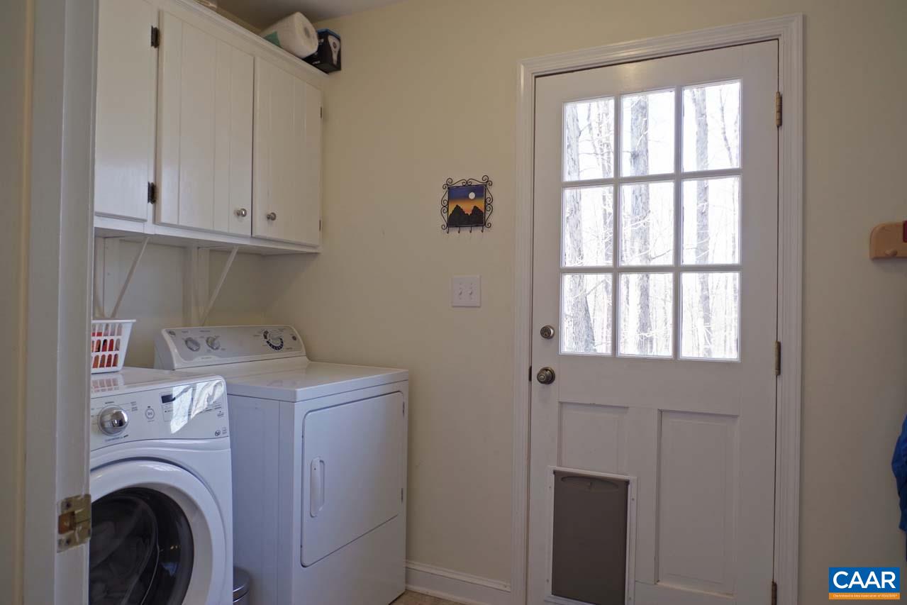 2657 Cardinal Ridge Road Charlottesville, VA 22901 - Photo 28 of 50 a view of storage and utility room with washer and dryer